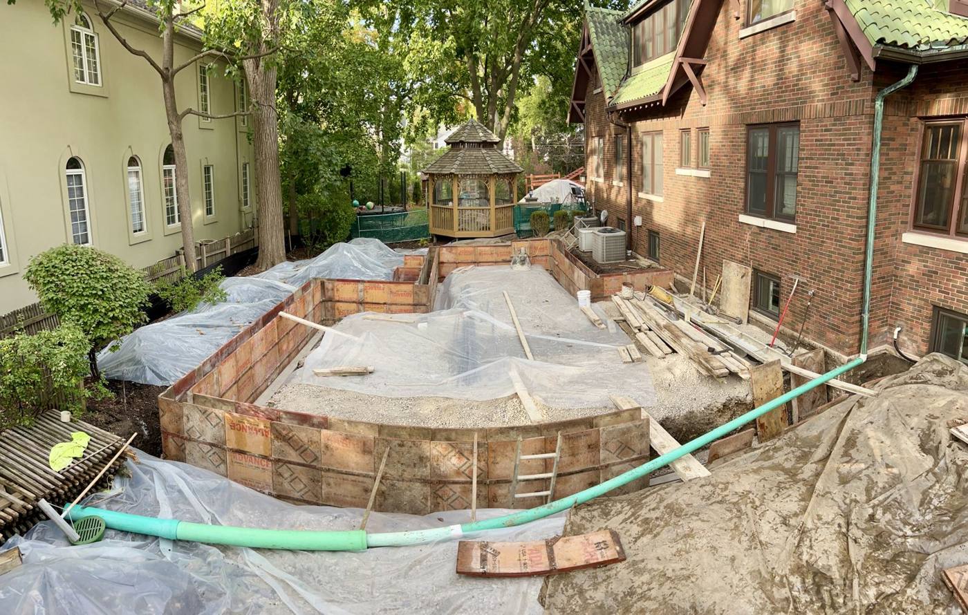 Wall forms set with the gazebo behind them