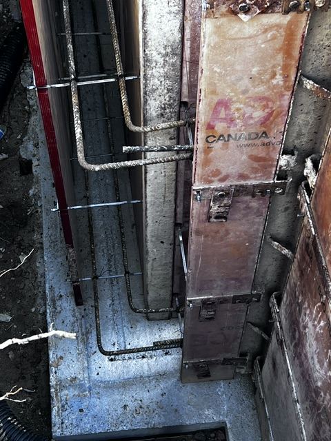 Horizontal and vertical rebar tied inside the wall forms